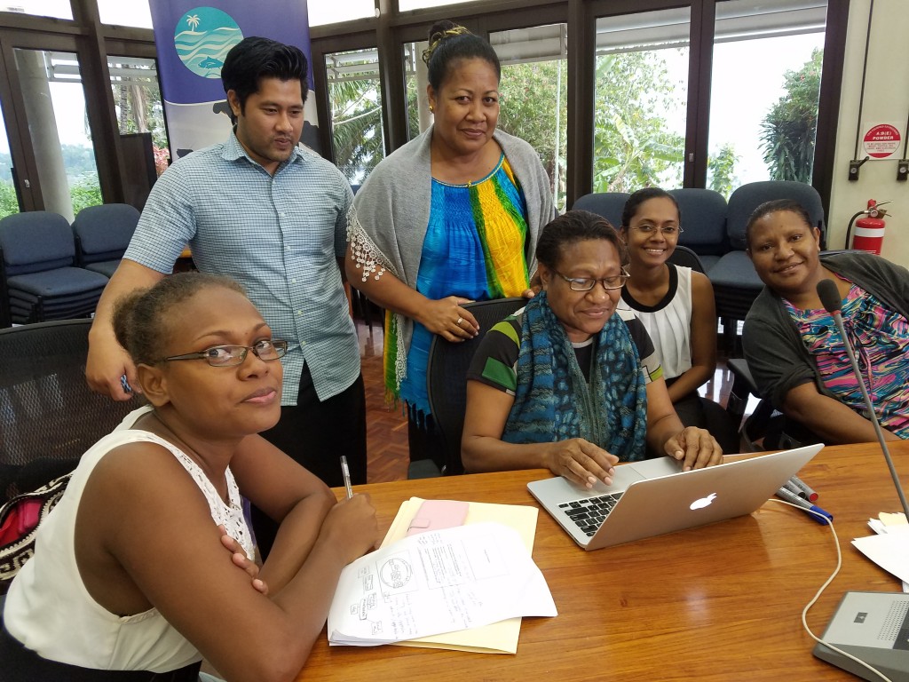 Participants from Papua New Guinea, Samoa and the Solomon Islands work on tracing their tuna value chains